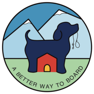 a dog boarding a house between his front and hind legs holding a leash in his mouth with mountains set behind set with the Colorado flag colors
